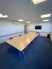 Tables and chairs in a room